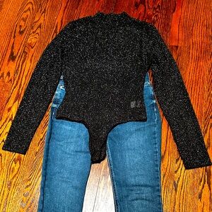 Shiny bodysuit, Top Chic, size Large. Never worn. Stretchy material